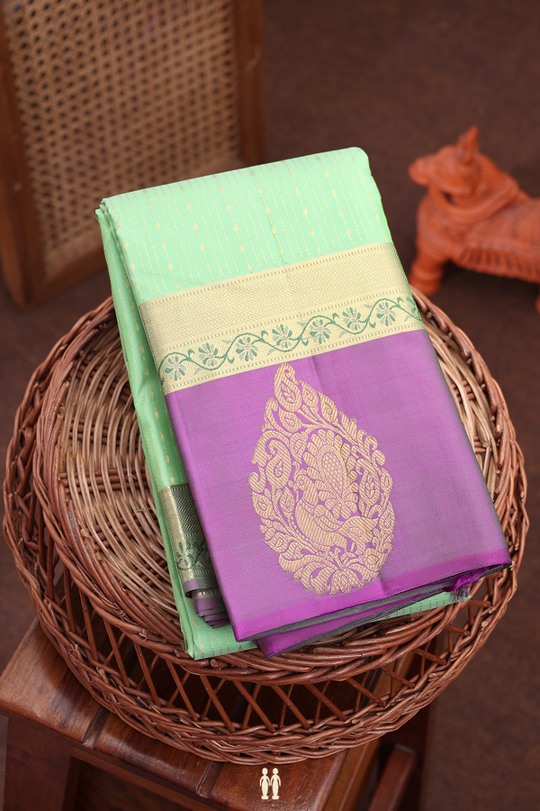 Kanchipuram Silk Saree In Pastel Green With Stripes Design