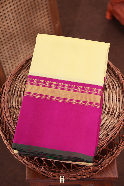Kanchipuram Silk Saree In Pale Yellow With Contrast Border