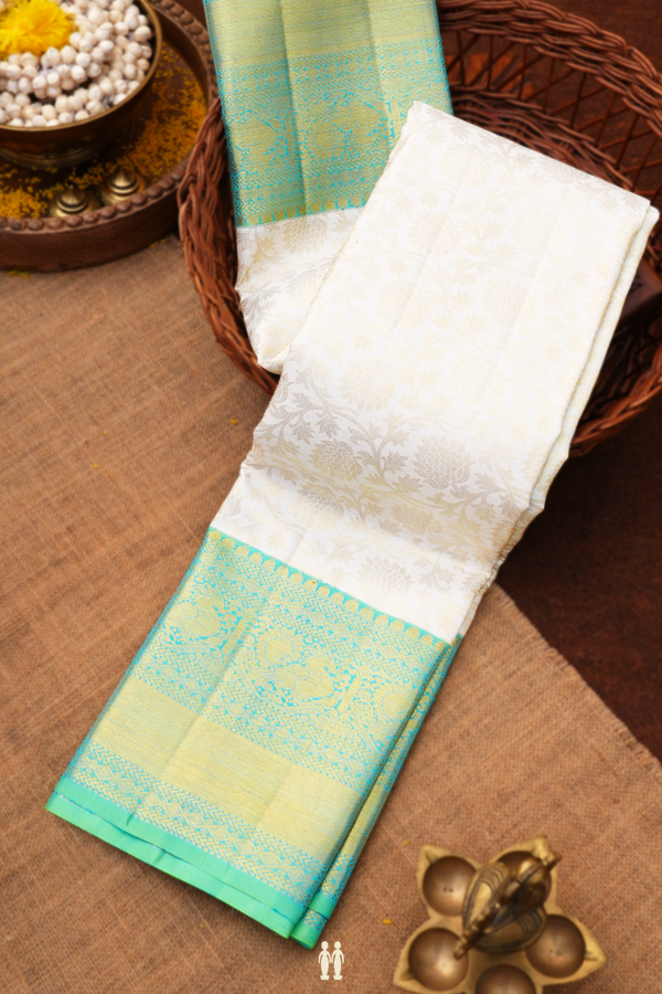 Kanchipuram Silk Saree In White With Floral Design