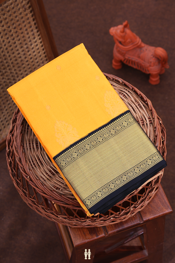 Kanchipuram Silk Saree In Mustard Yellow With Floral Buttas