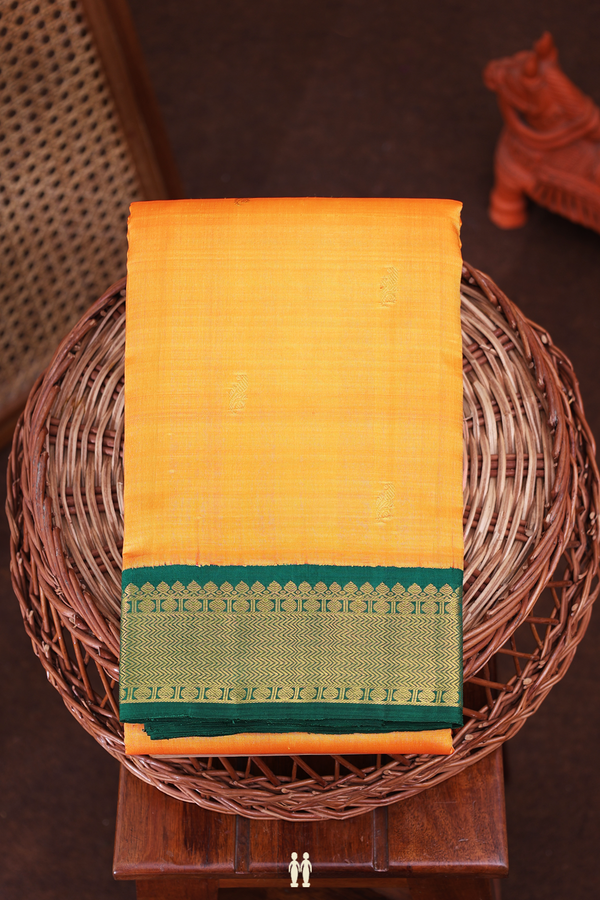Kanchipuram Silk Saree In Orange With Floral Buttas