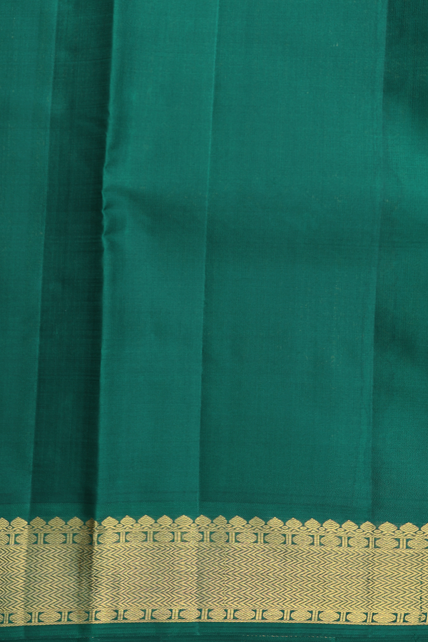 Kanchipuram Silk Saree In Orange With Floral Buttas