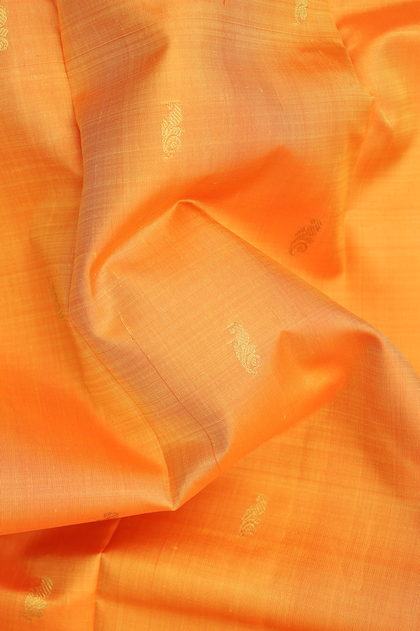 Kanchipuram Silk Saree In Orange With Floral Buttas