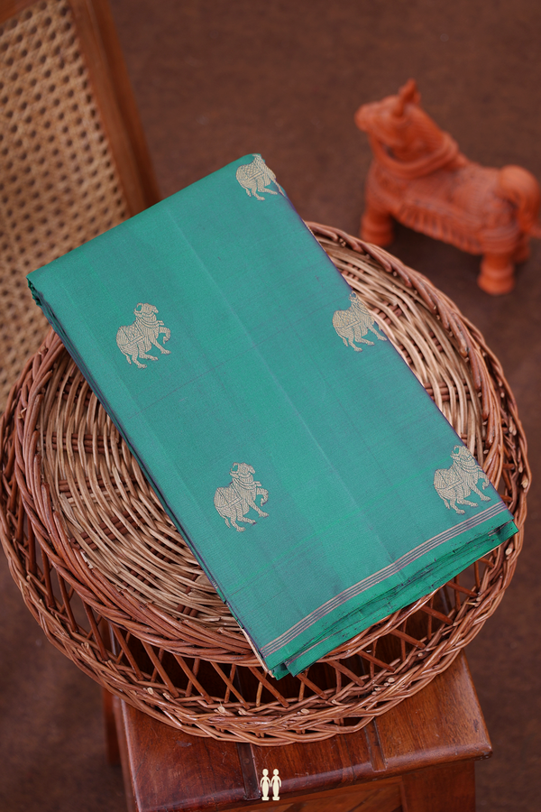 Kanchipuram Silk Saree In Peacock Green With Zari Buttas