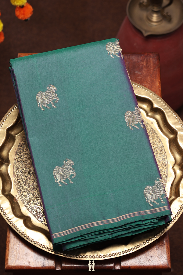 Kanchipuram Silk Saree In Peacock Green With Zari Buttas