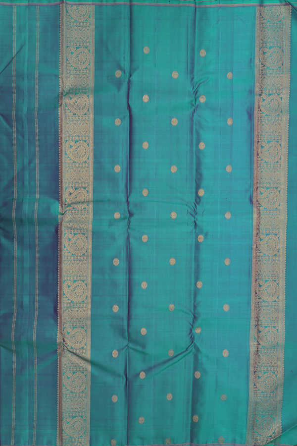 Kanchipuram Silk Saree In Peacock Green With Zari Buttas