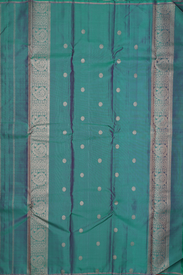 Kanchipuram Silk Saree In Peacock Green With Zari Buttas