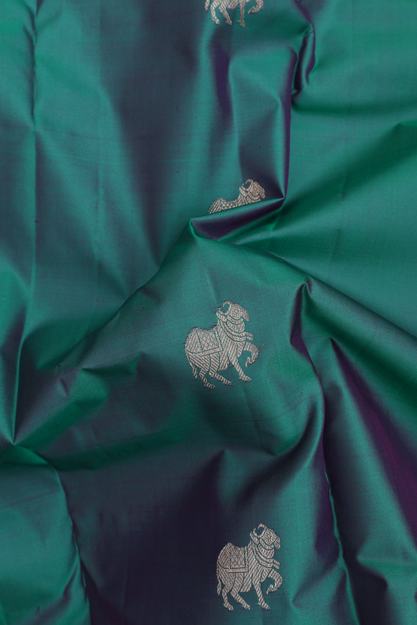 Kanchipuram Silk Saree In Peacock Green With Zari Buttas