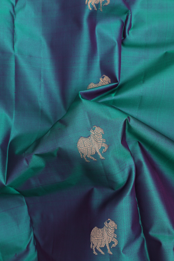 Kanchipuram Silk Saree In Peacock Green With Zari Buttas