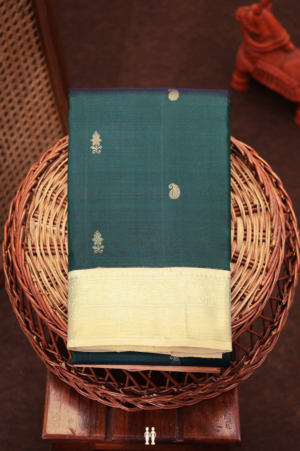 Kanchipuram Silk Saree In Dark Green With Paisley Buttas