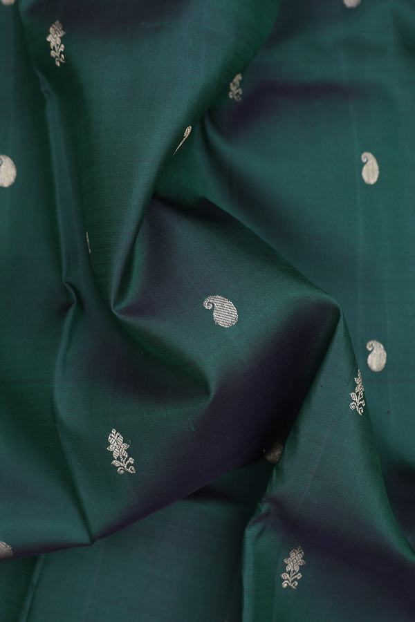 Kanchipuram Silk Saree In Dark Green With Paisley Buttas