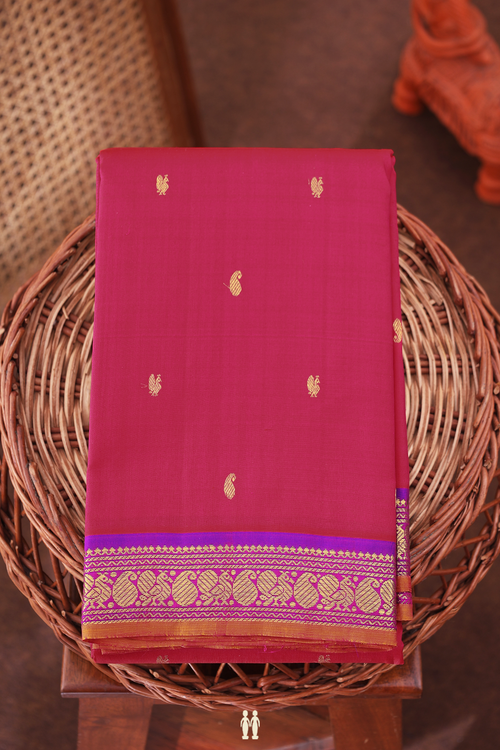 Kanchipuram Silk Saree In Rani Pink With Paisley Buttas