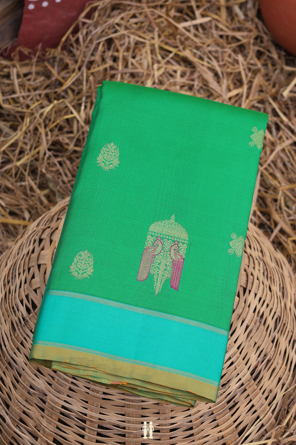 Kanchipuram Silk Saree In Green With Zari Buttas