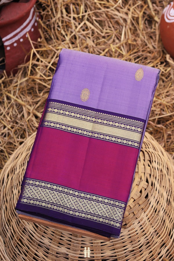 Kanchipuram Silk Saree In Bluish Purple With Chakram Buttas