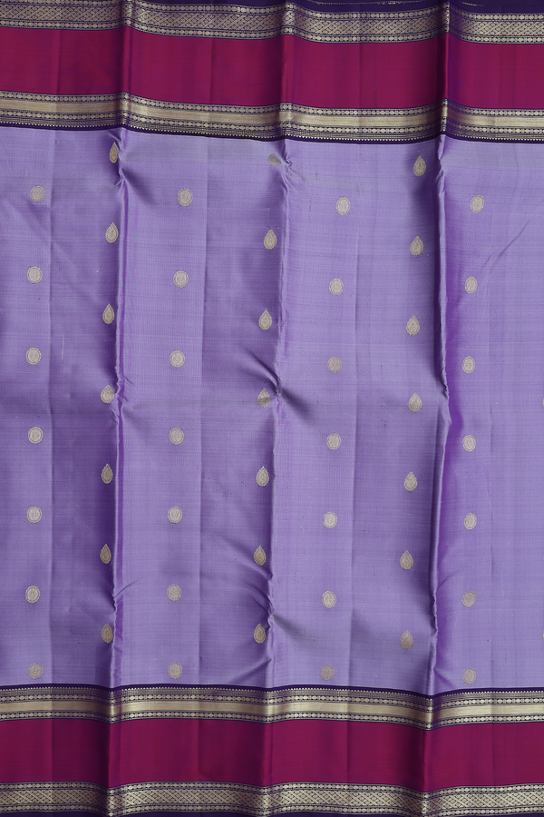 Kanchipuram Silk Saree In Bluish Purple With Chakram Buttas