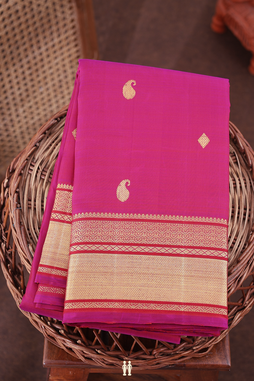 Kanchipuram Silk Saree In Magenta With Paisley Buttas