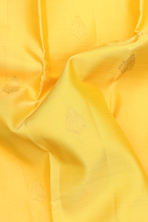 Kanchipuram Silk Saree In Royal Yellow With Zari Buttas