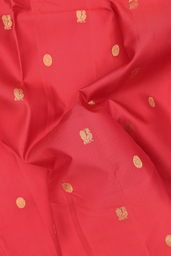 Kanchipuram Silk Saree In Vermillion Red With Peacock Buttas