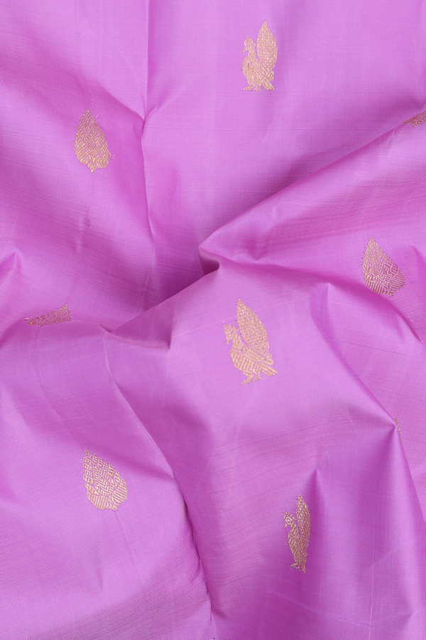 Kanchipuram Silk Saree In Lotus Pink With Peacock Buttas