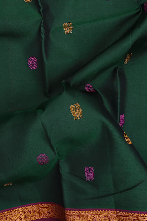 kanchipuram Silk Saree In Forest Green With Peacock Buttas