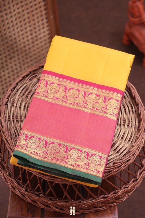 Kanchipuram Silk Saree In Yellow With Rettai Pettu Border