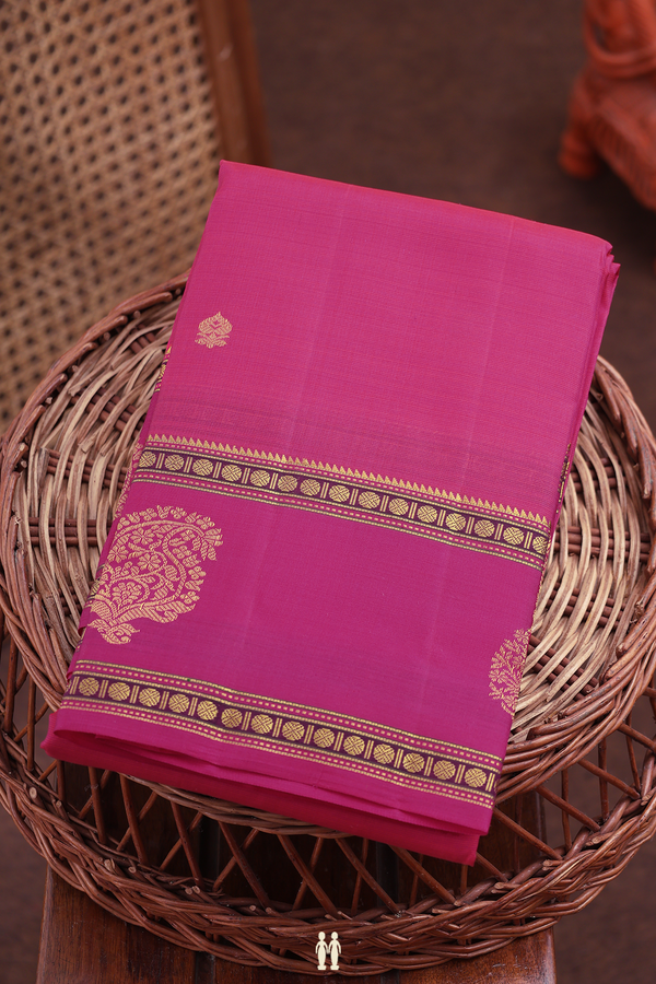 Kanchipuram Silk Saree In Rani Pink With Floral Buttas