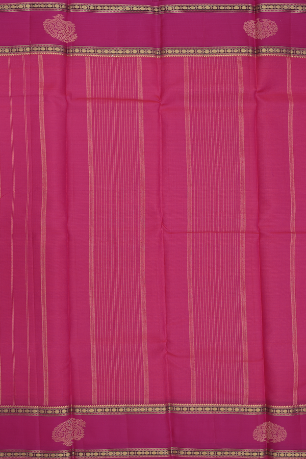 Kanchipuram Silk Saree In Rani Pink With Floral Buttas