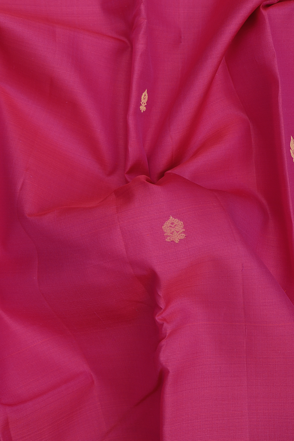 Kanchipuram Silk Saree In Rani Pink With Floral Buttas