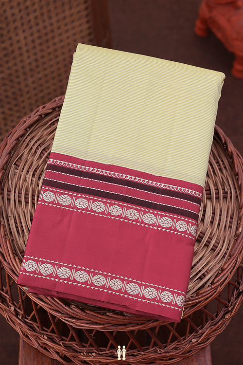 Kanchipuram Silk Saree In Cream Color With Stripes Design