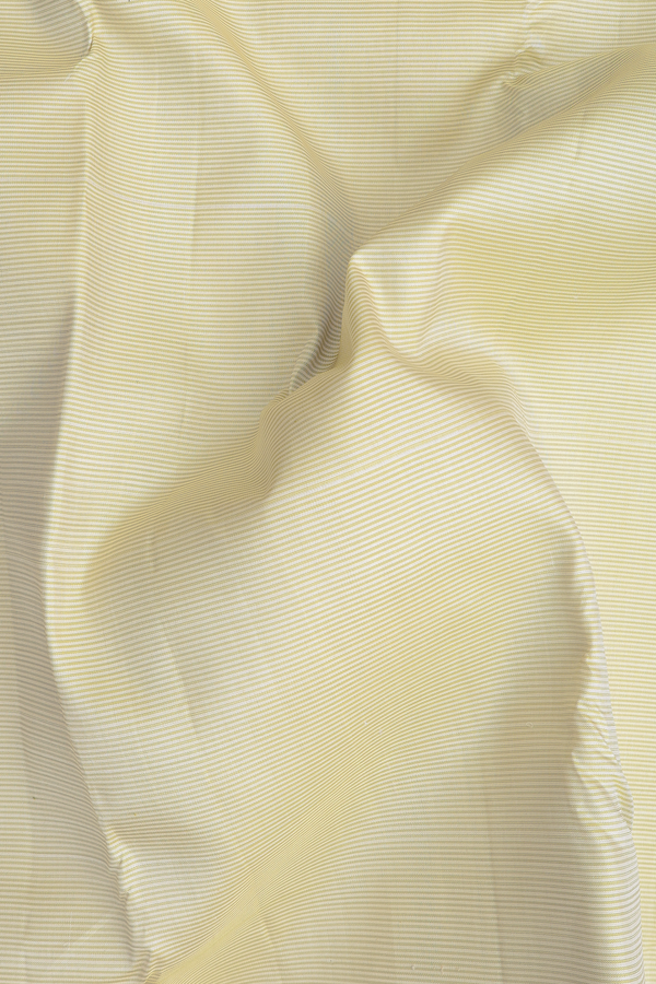 Kanchipuram Silk Saree In Cream Color With Stripes Design