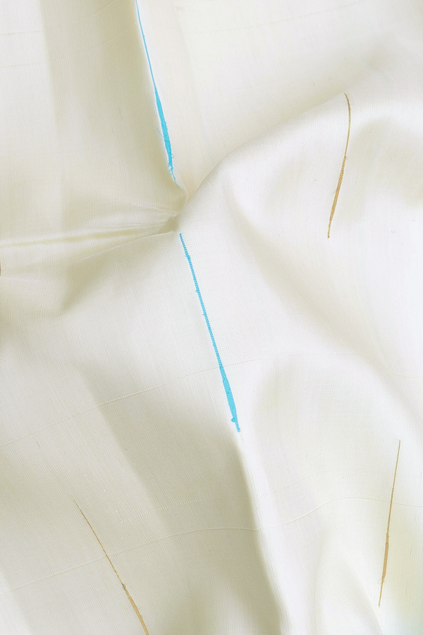 Kanchipuram Silk Saree In White With Malli Moggu Buttas