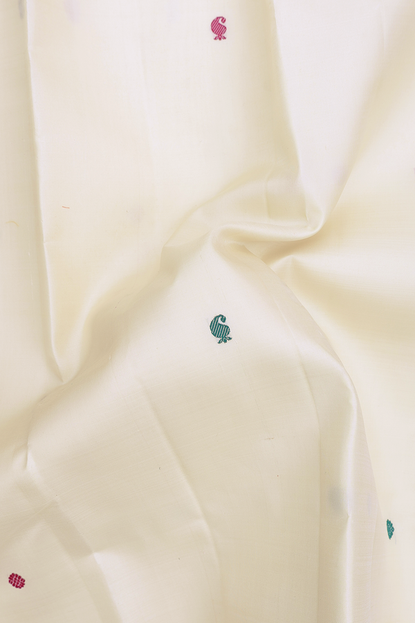 Kanchipuram Silk Saree In White With Paisley Buttas