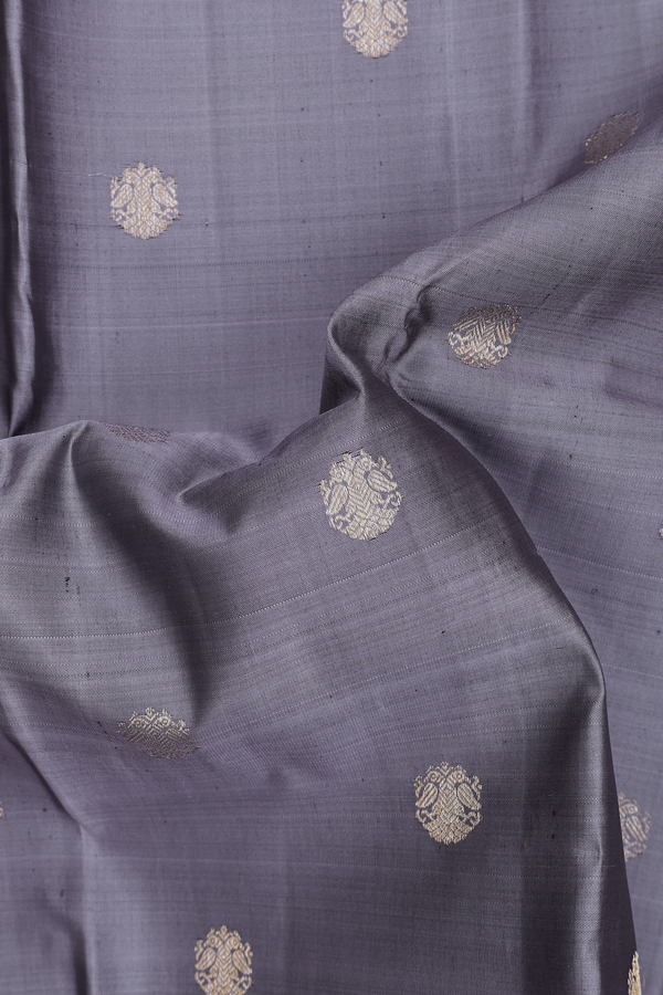 Kanchipuram Silk Saree In Grey With Iruthalai Pakshi Buttas