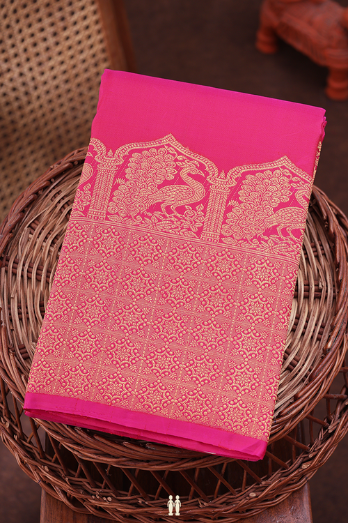 Kanchipuram Silk Saree In Rani Pink With Peacock Buttas