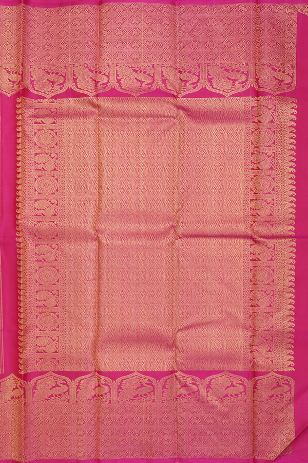 Kanchipuram Silk Saree In Rani Pink With Peacock Buttas
