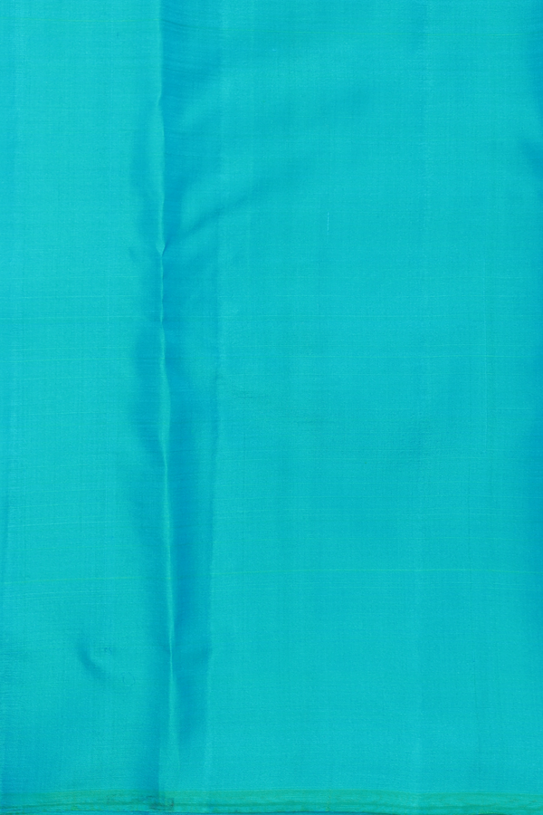 Kanchipuram Silk Saree In Cerulean Blue With Zari Buttas