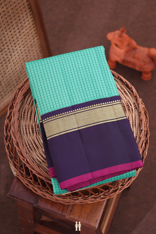 Kanchipuram Silk Saree In Green With Checks Design