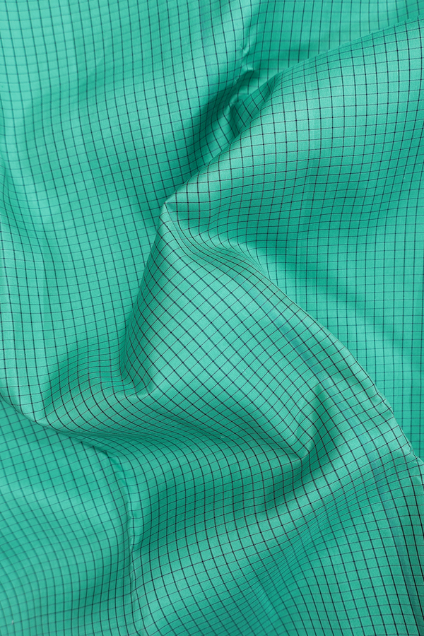 Kanchipuram Silk Saree In Green With Checks Design