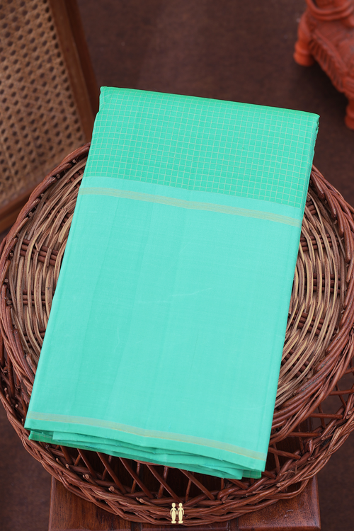 Kanchipuram Silk Saree In Green With Checks Design