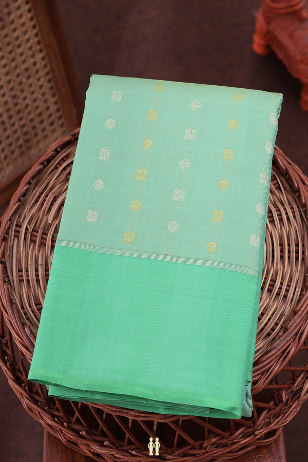 Kanchipuram Silk Saree In Green With Peacock Buttas
