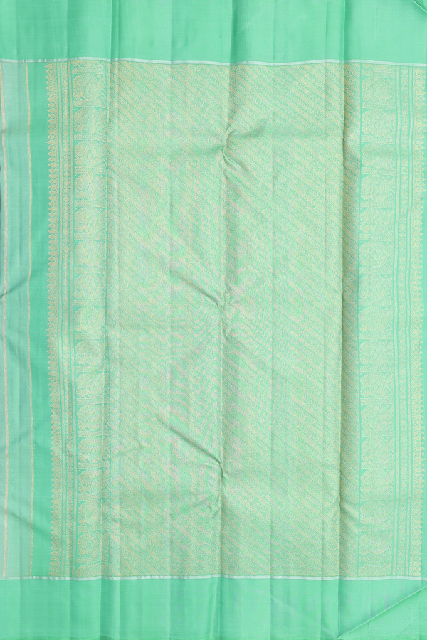 Kanchipuram Silk Saree In Green With Peacock Buttas