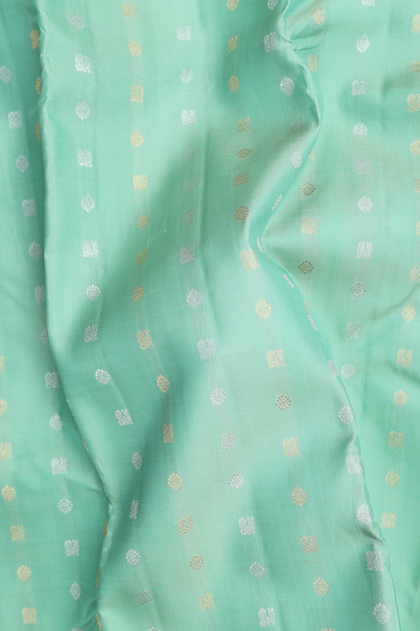 Kanchipuram Silk Saree In Green With Peacock Buttas