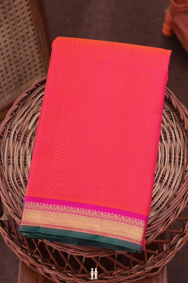 Kanchipuram Silk Saree In Coral Orange With Contrast Border