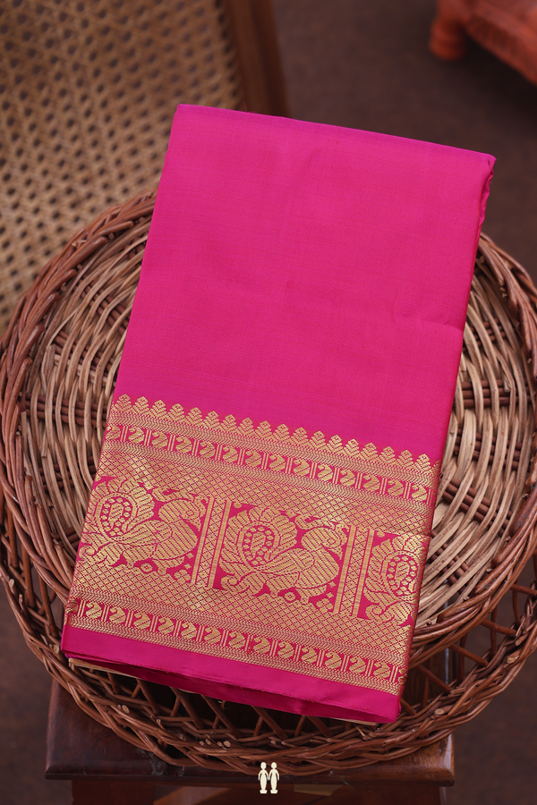 Kanchipuram Silk Saree In Rani Pink With Zari Border