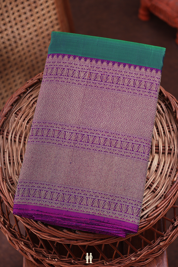 Kanchipuram Silk Saree In Green With Peacock Buttas