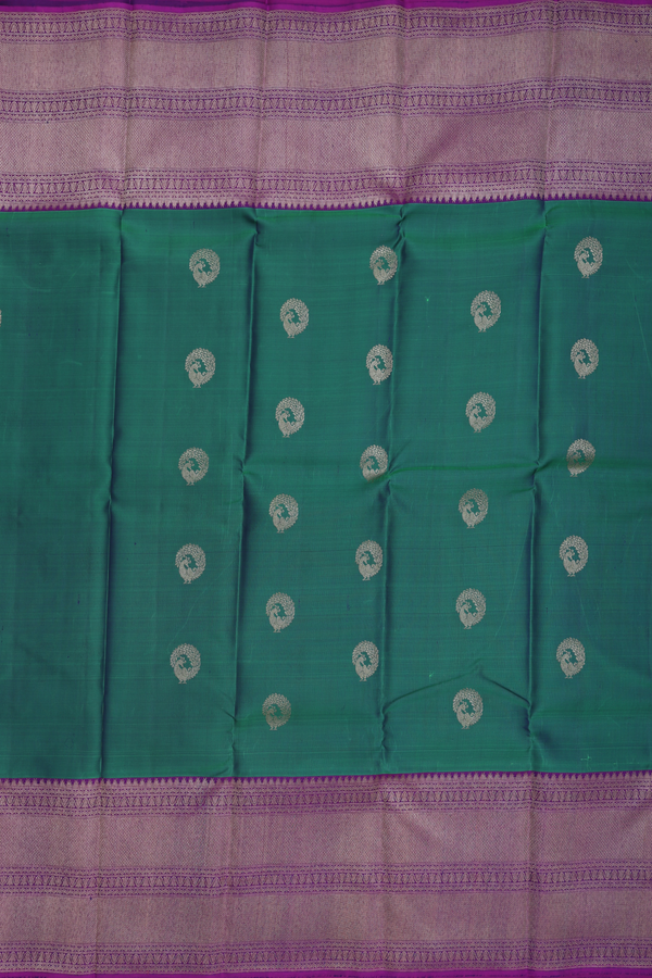 Kanchipuram Silk Saree In Green With Peacock Buttas