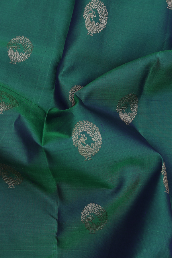 Kanchipuram Silk Saree In Green With Peacock Buttas