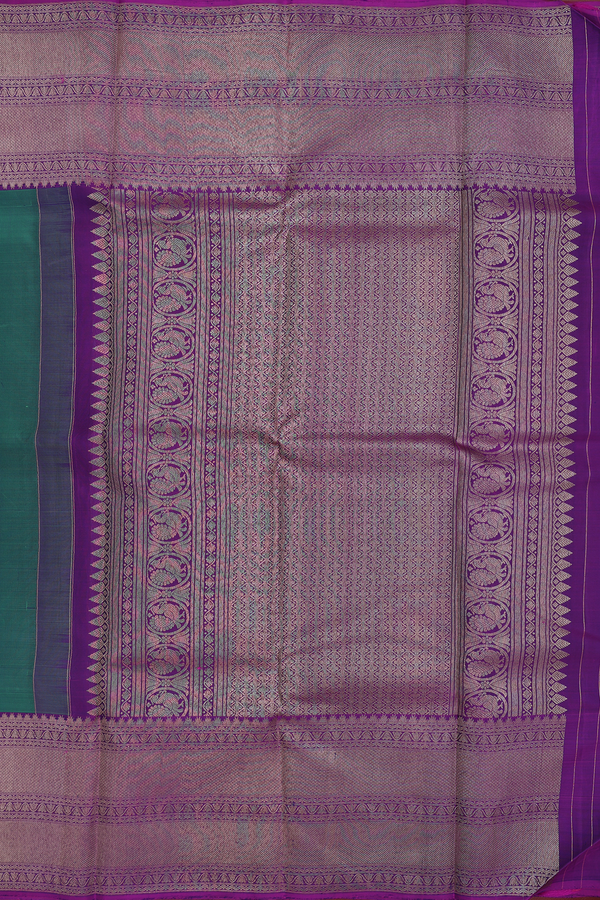 Kanchipuram Silk Saree In Green With Peacock Buttas