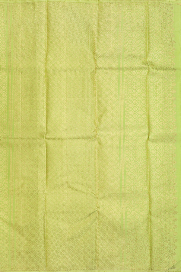 Kanchipuram Silk Saree In Pear Green With Zari Buttas