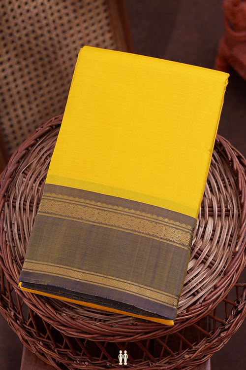 Kanchipuram Silk Saree In Yellow With Self Stripes Design